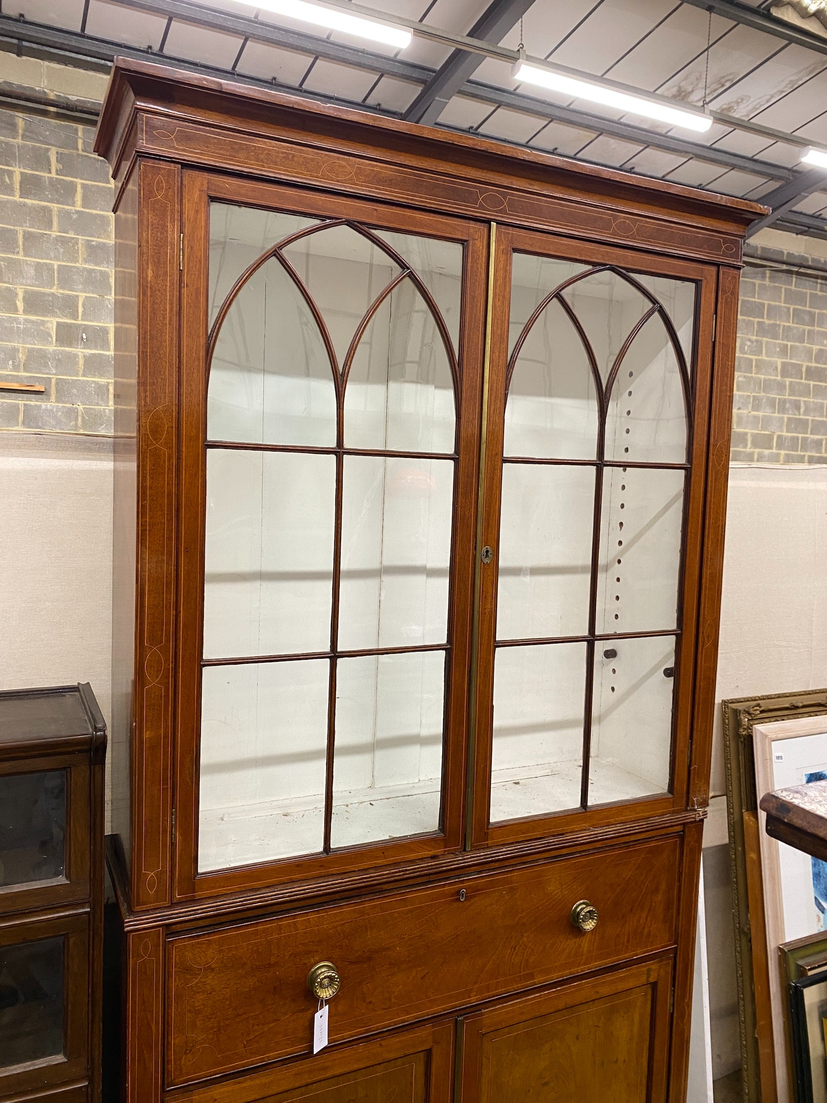 A George III mahogany secretaire bookcase, length 122cm, depth 33cm, height 232cm